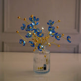 Blue Blossoms in Crystal Vase